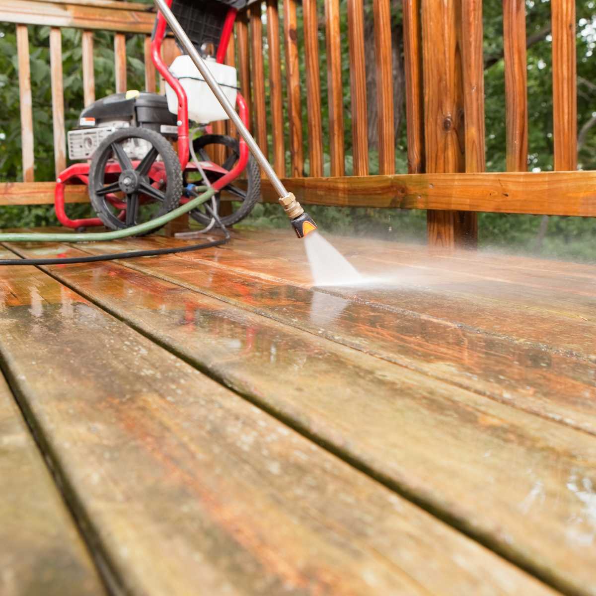 Cleaning the deck with pressure washer