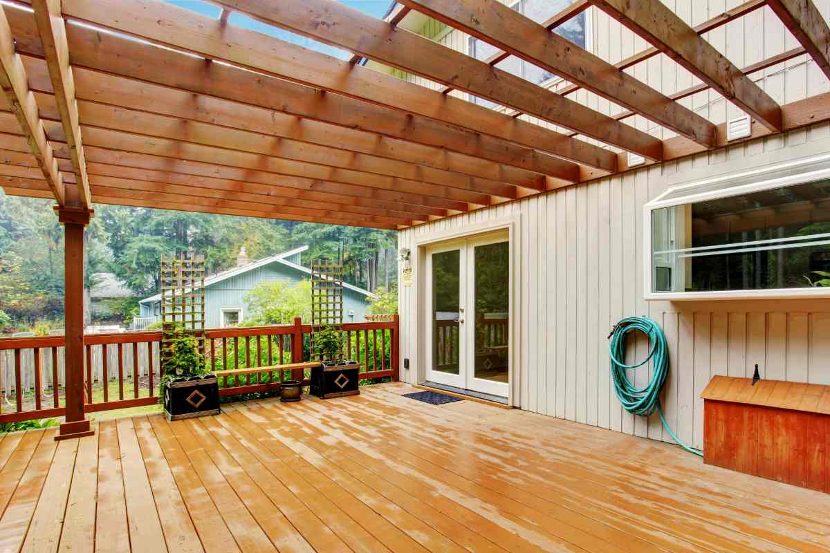 attached wood pergola roof to the house