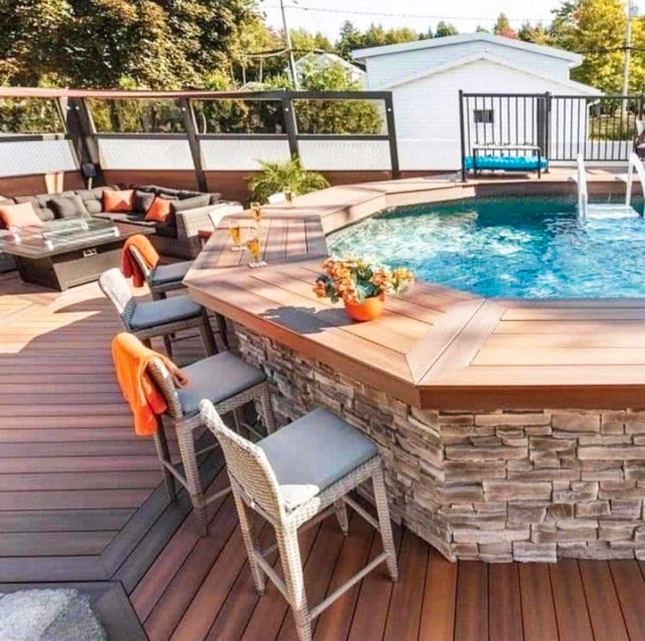 above ground pool deck elevated with a bar